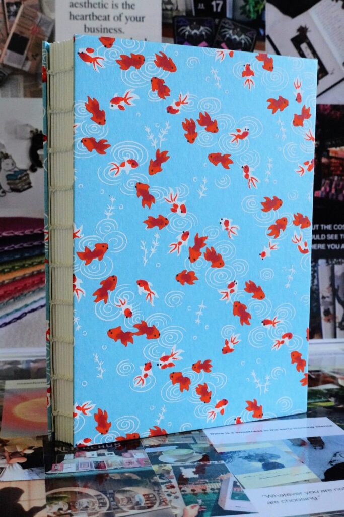 goldfish blue - watercolour book - coptic stitch (single thread)